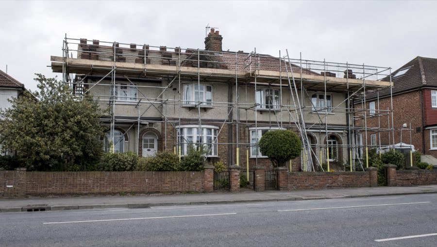 Scaffold platforms providing access around a house roof